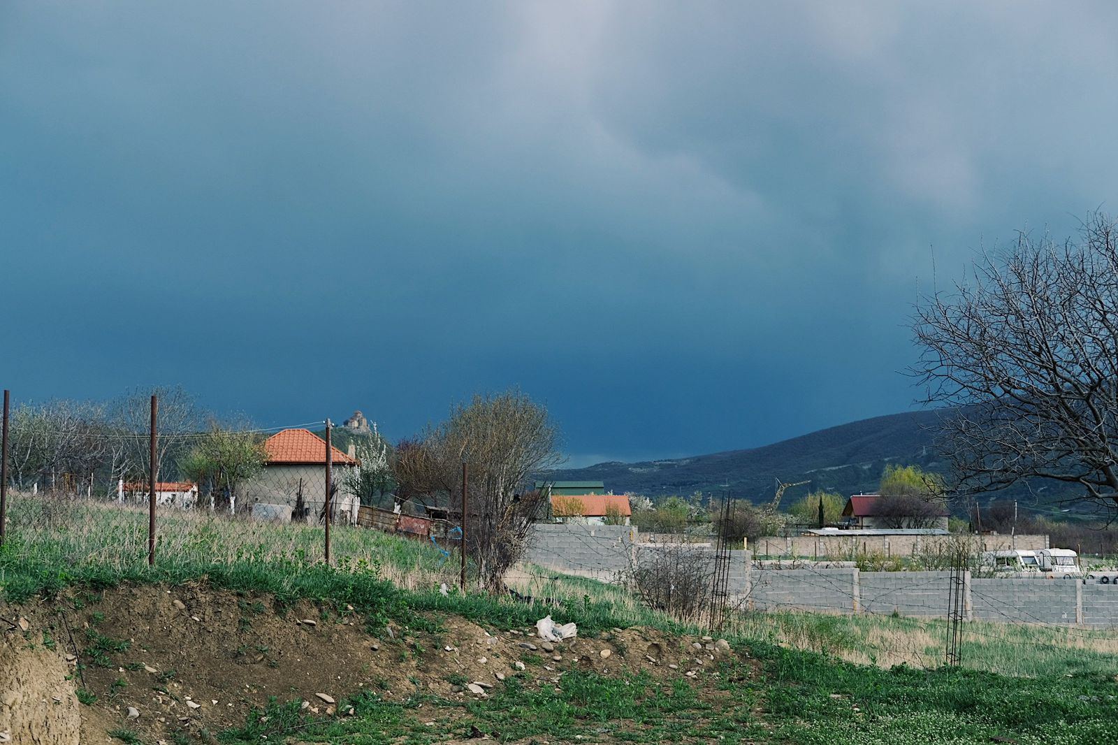 Dark storm clouds gathering over the mountain campsite